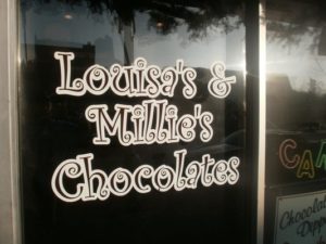 Louisa's & Millie's Chocolates logo